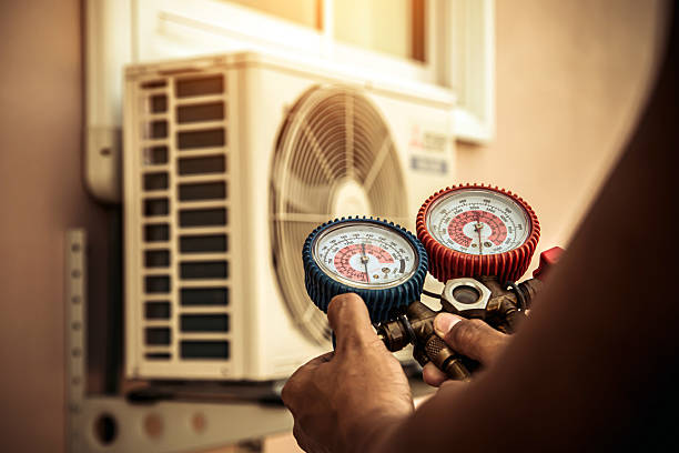 Professional Air Conditioning Service technician working in Ferndale, MI
